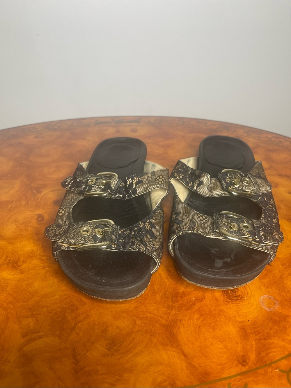 Stuart Weitzman Black and Gold Lace-Overlay Double Buckle Slides
